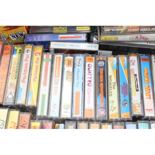 1547 - A large qty of vintage computer games cassettes, mainly Spectrum & Amstrad etc