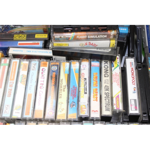 1547 - A large qty of vintage computer games cassettes, mainly Spectrum & Amstrad etc