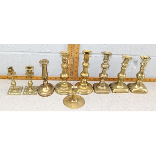 1847 - 9 assorted antique and later brass candlesticks