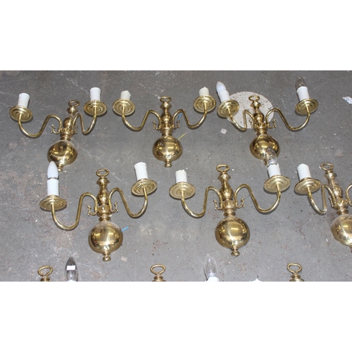 257 - 9 brass double wall lights and shades