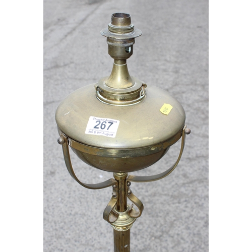 267 - An impressive vintage brass standard lamp on three feet