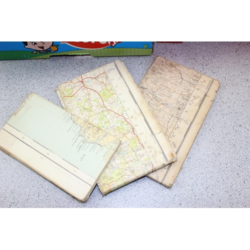 594 - 2 boxes of assorted folding maps, mainly Ordnance Survey, older versions