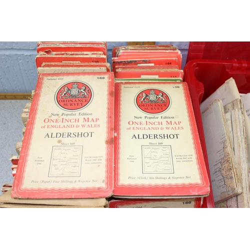 594 - 2 boxes of assorted folding maps, mainly Ordnance Survey, older versions