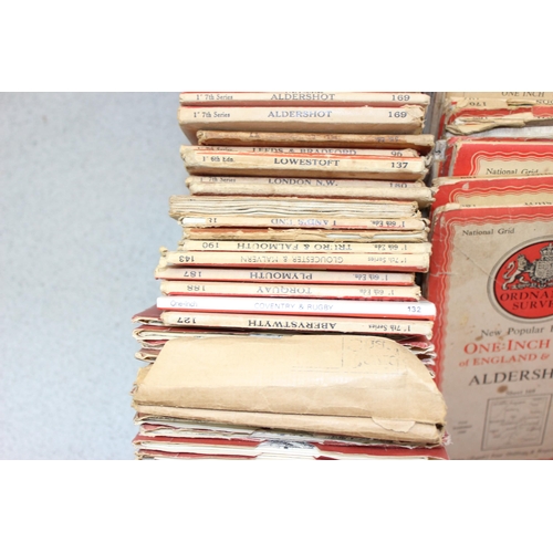 594 - 2 boxes of assorted folding maps, mainly Ordnance Survey, older versions