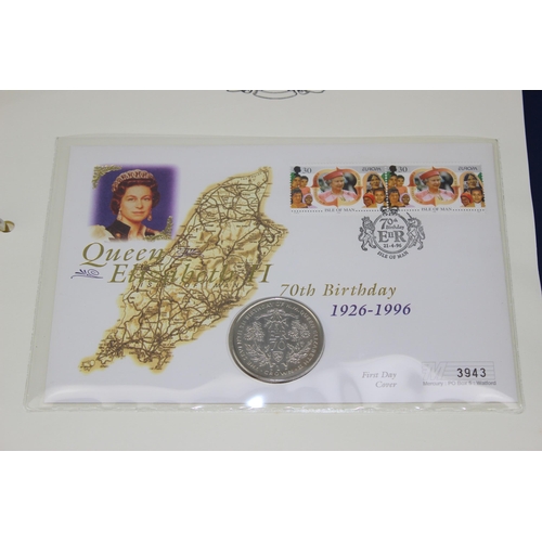 602 - 2 Albums of Royal Family coin covers to inc £5 coins