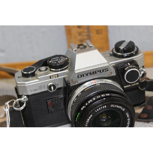 715 - Olympus OM10 camera with Olympus OM System Zuiko MC Auto-W 1:2.8 f=28mm lens