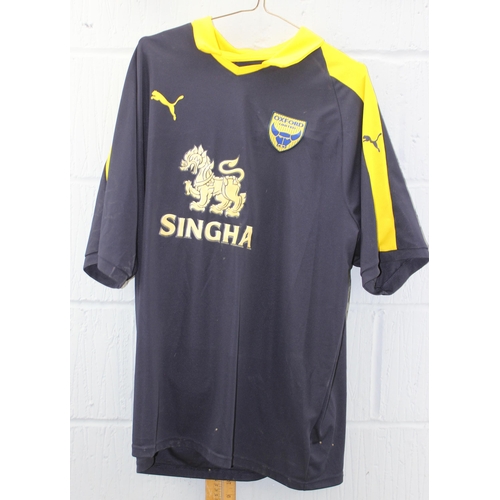 778 - 7 Oxford United football related shirts and t-shirts, all XL or larger