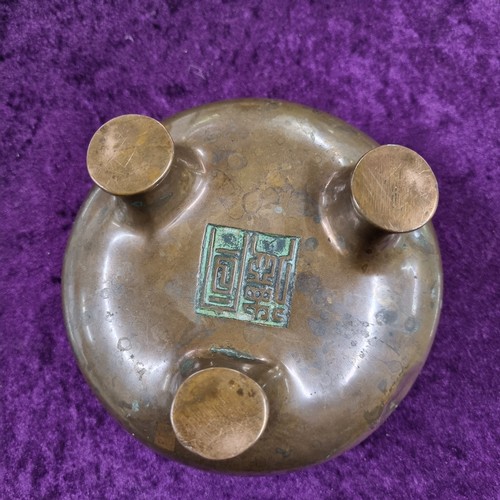 1625 - An antique Chinese bronze censor standing on 3 feet, impressed seal mark to base, approx 125mm in di... 