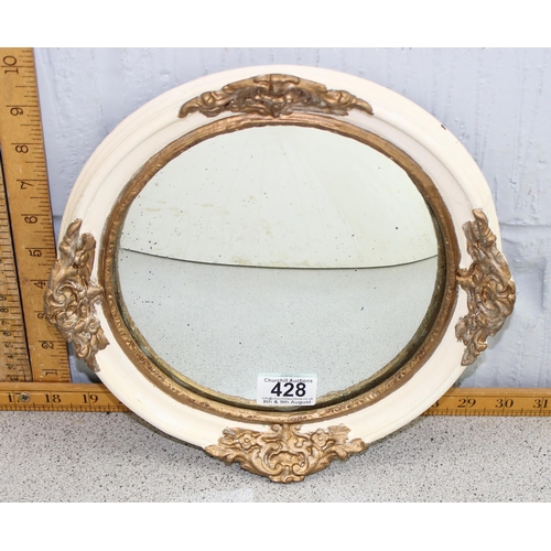 428A - A vintage white and gilt painted convex mirror