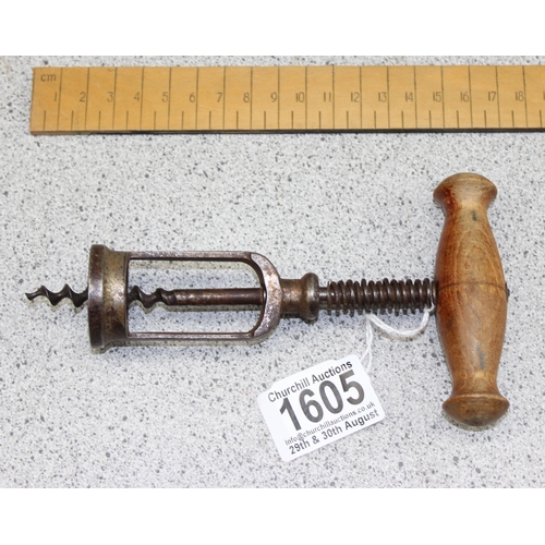 1605 - An unusual antique corkscrew with sprung mechanism