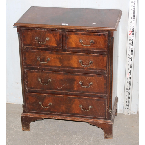 2 - A small mahogany finish 2 over 3 chest of drawers, approx 63cm wide `