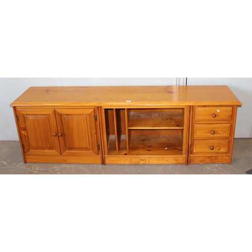 24 - A long low pine sideboard, approx 207cm wide