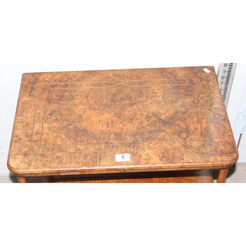 6 - A small antique walnut end table with drawer, on brass and ceramic castors