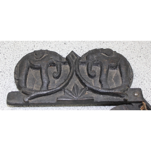 701 - A pair of vintage balance scales in carved wooden case, elephant related carving