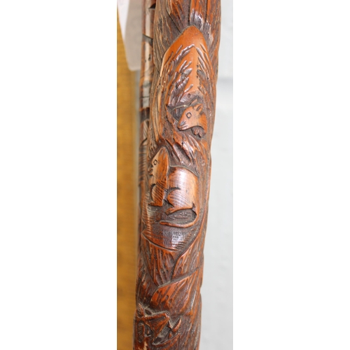 1607 - 2 vintage Oriental carved bamboo walking canes