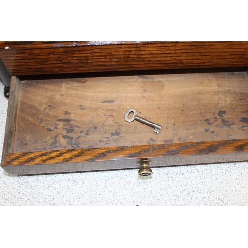 271 - An early 20th century oak desktop stationery box with key