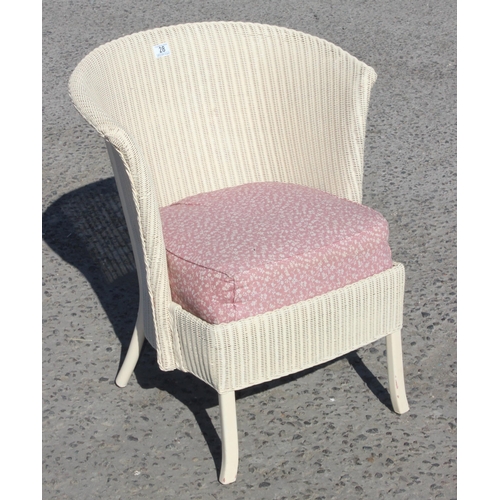 28 - A vintage woven chair with sprung upholstered seat, likely Lloyd Loom