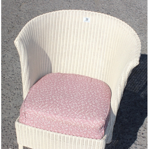 28 - A vintage woven chair with sprung upholstered seat, likely Lloyd Loom