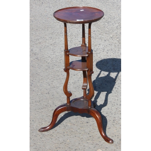 35 - A mahogany torchiere stand