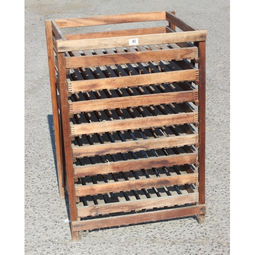 45 - A vintage rustic wooden apple rack with 8 slide out trays