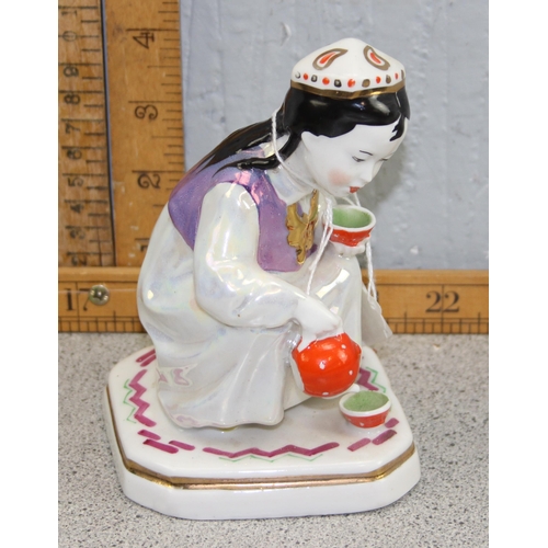 1619 - A vintage Russian lustre porcelain model of a girl