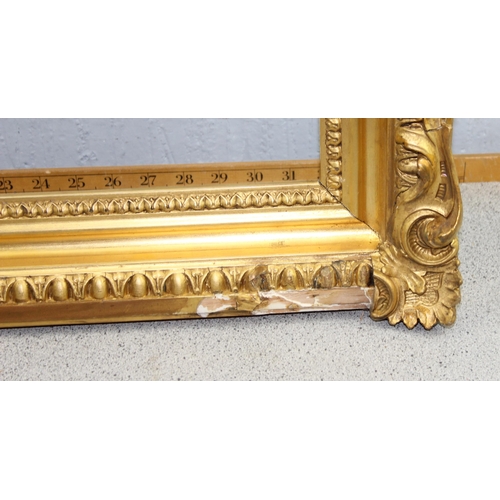 426 - An impressive antique gilt frame