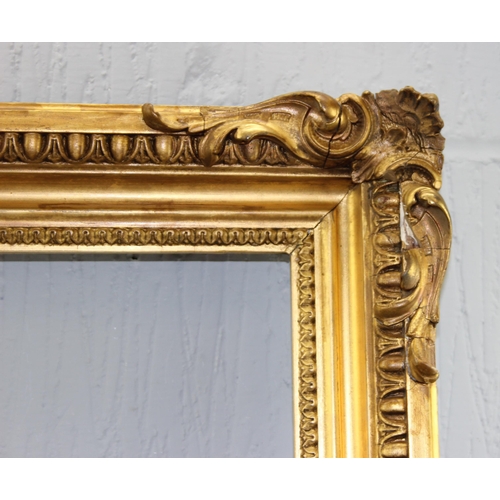 426 - An impressive antique gilt frame