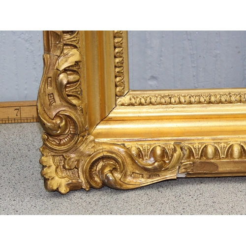 426 - An impressive antique gilt frame