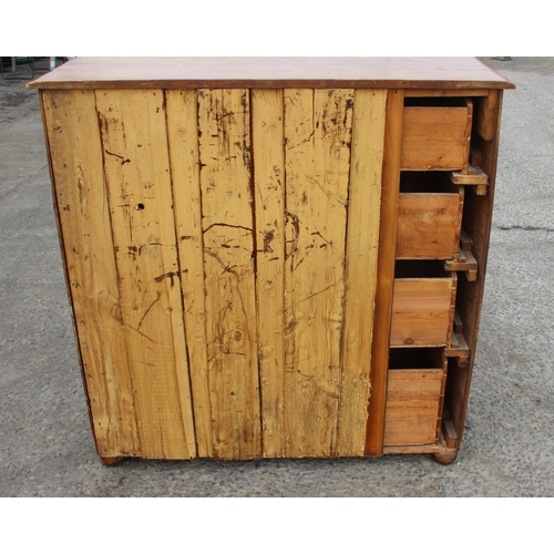 55 - A large Victorian pitch pine 2/3 chest of drawers with turned wooden handles, approx 122cm wide x 12... 