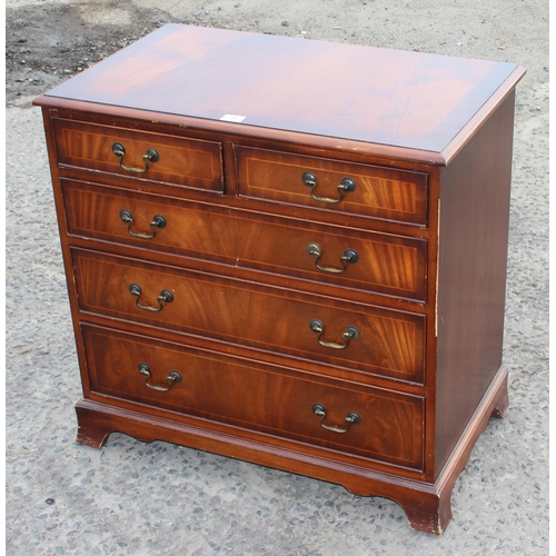 56 - A Georgian style mahogany 2/3 chest of drawers