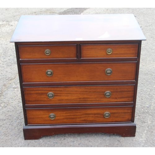 57 - A Georgian style mahogany 2/3 chest of drawers