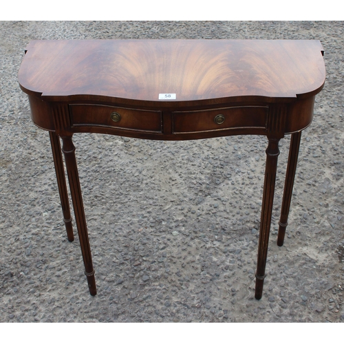 58 - An antique style mahogany console or hall table with 2 drawers