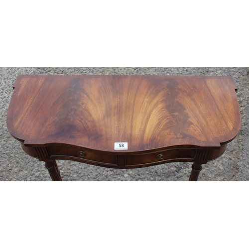 58 - An antique style mahogany console or hall table with 2 drawers