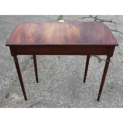 58 - An antique style mahogany console or hall table with 2 drawers