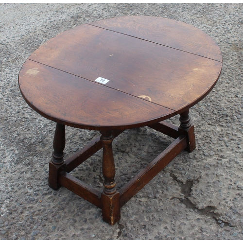 59 - A small vintage oak drop leaf side table