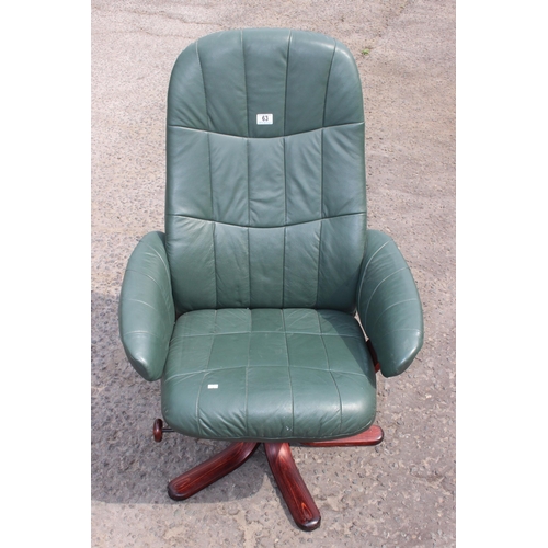 63 - A retro Ekornes style reclining chair, green leatherette