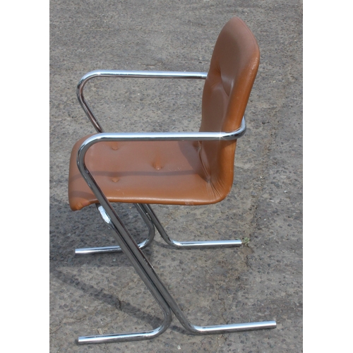 69 - Tavo of Belgium, a set of 3 chrome legged cantilever chairs, one with label