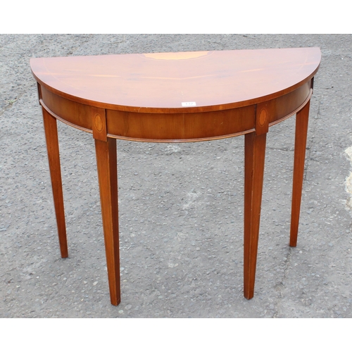 132 - Yew wood demi-lune table with Sheraton style inlay