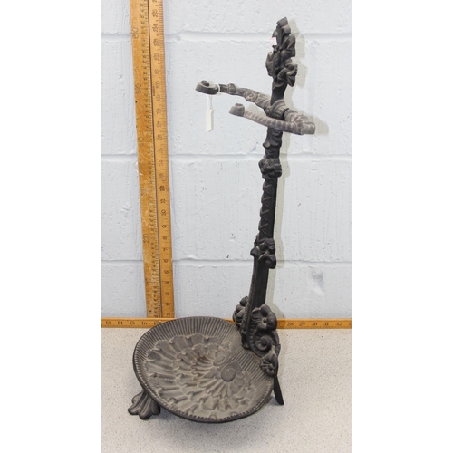 135 - A Victorian style cast iron stick stand with drip tray