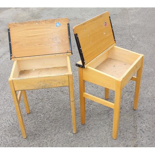 136 - A pair of vintage wooden school desks