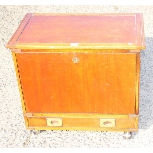 140 - An unusual campaign style wooden box on legs with single drawer