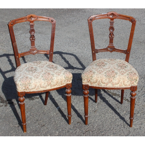 143 - A pair of Victorian upholstered bedroom chairs with stuffed seats