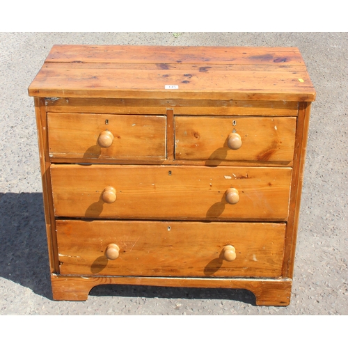 145 - An antique 2 over 2 pitch pine chest of draws of nice small proportion