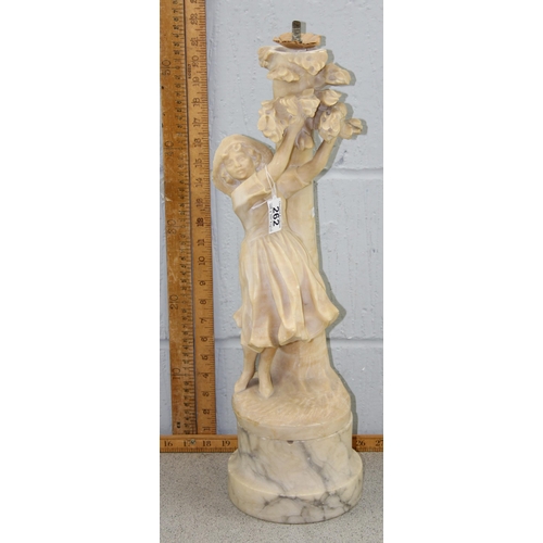 262 - A large vintage carved alabaster or marble carved lamp base depicting a girl under a tree, approx 55... 