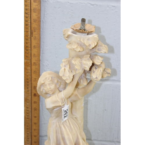 262 - A large vintage carved alabaster or marble carved lamp base depicting a girl under a tree, approx 55... 