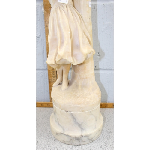 262 - A large vintage carved alabaster or marble carved lamp base depicting a girl under a tree, approx 55... 