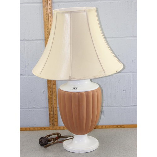 266 - A large white and terracotta ribbed table lamp