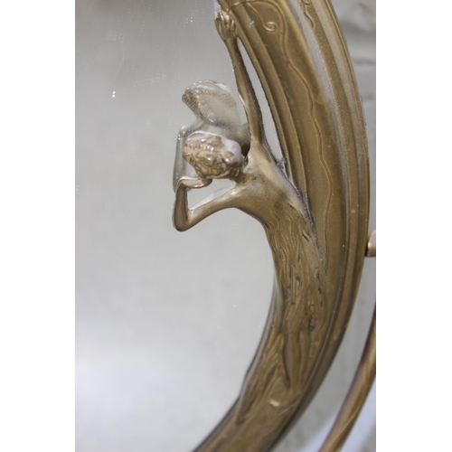 280 - An Art Nouveau style brass table top mirror with female figure