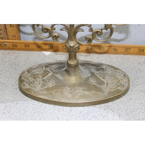 280 - An Art Nouveau style brass table top mirror with female figure