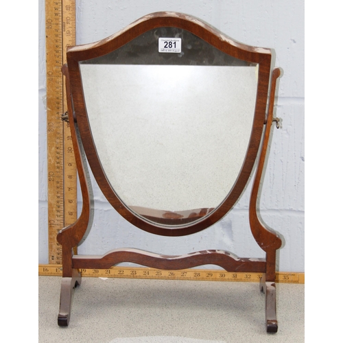 281 - An antique mahogany shield shaped dressing table mirror